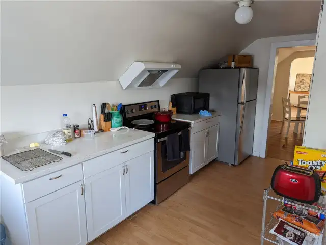 Renovated kitchen of upstairs unit 2