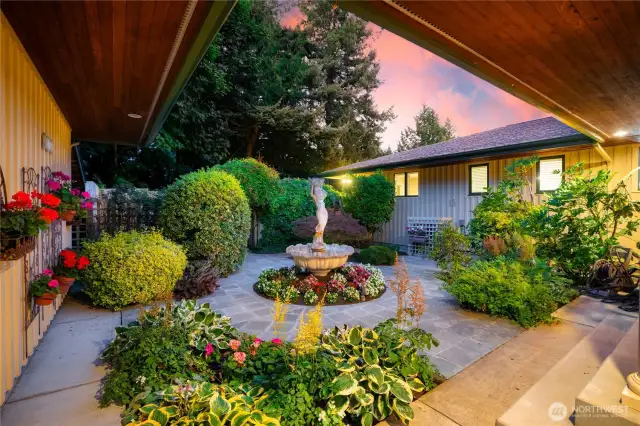 Gorgeous, lush, and a hidden oasis through the archway in the back.