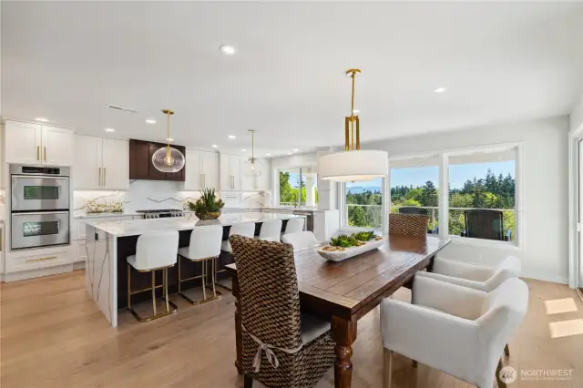 Do you like to cook and entertain?  There is plenty of space for all of your friends and relatives to enjoy your new home and huge kitchen, eating space and dining area.  To the left of the table are French Doors to the huge Deck.