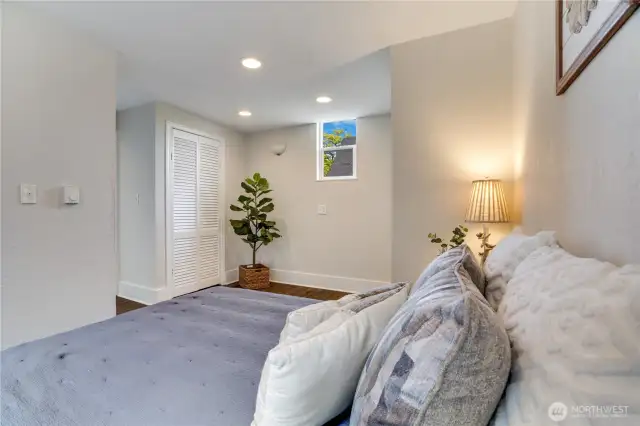 In addition to its generous size, this bedroom offers extra space for a dresser or a desk—perfect for storage, work-from-home setups, or a cozy reading nook