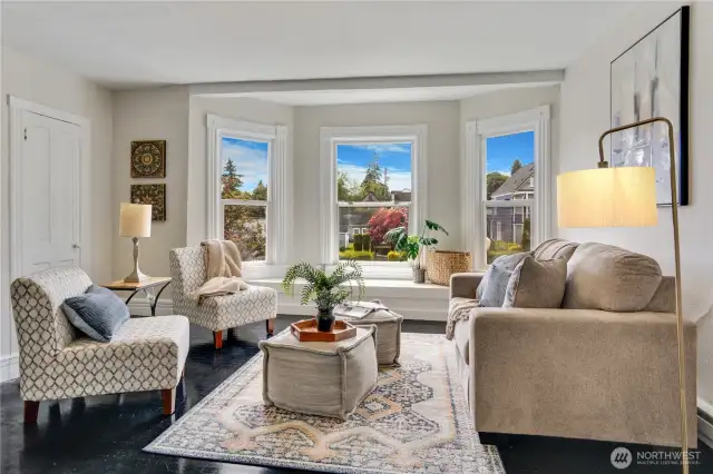 Curl up with your morning coffee and a good book as you enjoy the views of this amenity-rich neighborhood. To the left is a great storage closet which is hard to find in multi-living units!