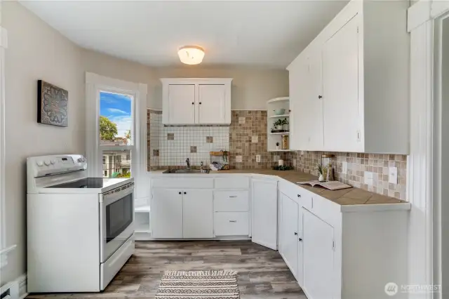With ample storage and generous counter space, this upstairs kitchen is both practical and stylish. Durable LVF flooring makes cleanup a breeze, ensuring effortless maintenance for everyday use.