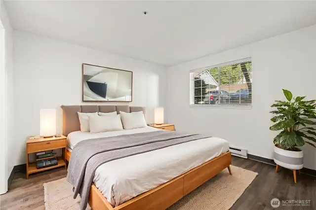 Spacious primary bedroom complete with a private ensuite bath and a walk-in closet—offering comfort, privacy, and plenty of storage.