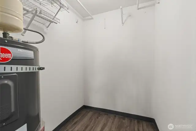 Walk-in closet in the primary suite offers ample space and smart organization for all your wardrobe needs.