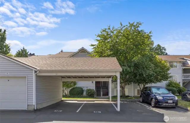 Additional carport parking spot provides easy access and extra convenience.