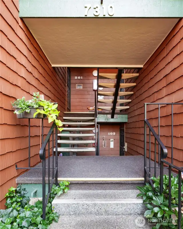 This inviting corner unit is just a few steps up from the parking lot—easy and accessible.