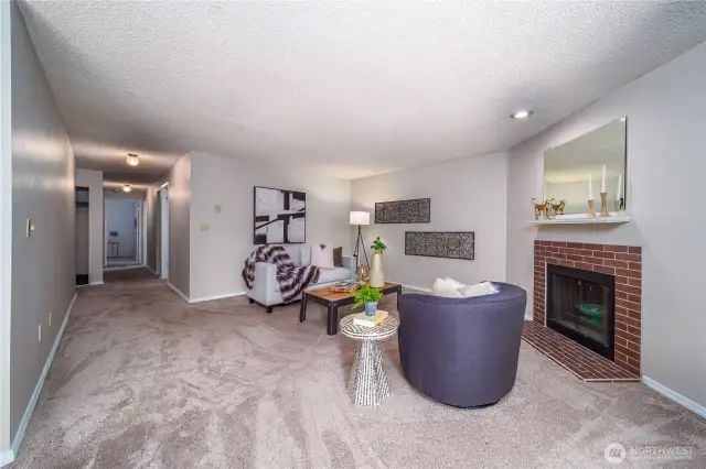 Down the hall, discover the den and two comfortable bedrooms.