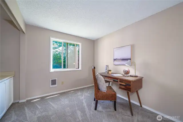 First stop: the versatile den or home office—ideal for remote work or hobbies.