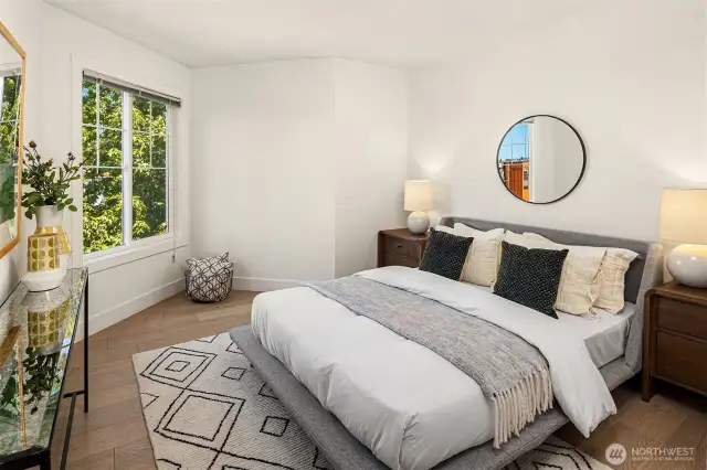 Primary bedroom, with Olympic and peekaboo Sound views.
