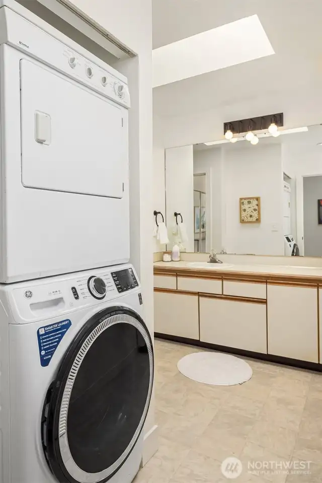 In-unit washer-dryer in the large "jack 'n' jill" bathroom.