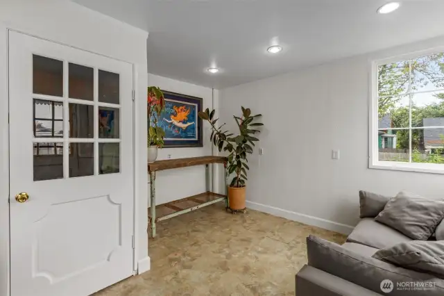 Breakfast nook off kitchen with access to unfinished basement