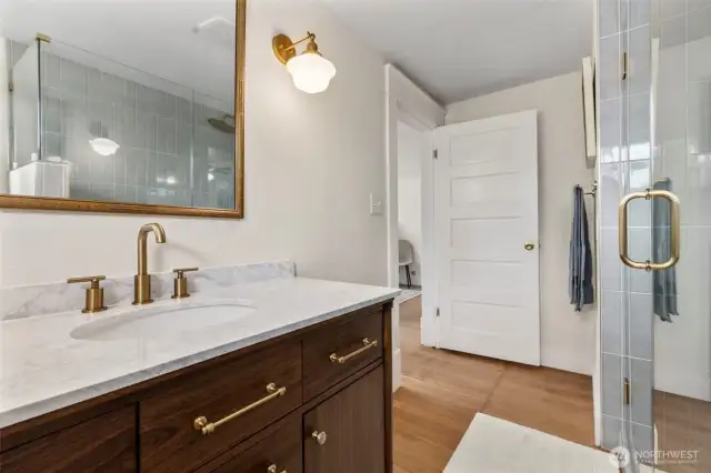 Newly renovated bathroom with high end finishes and custom tile