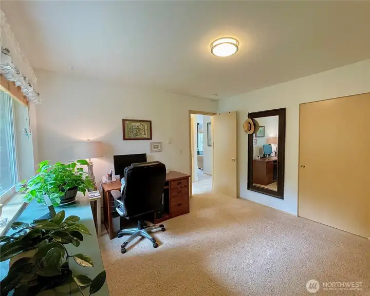 Second bedroom, currently used as home office for two!