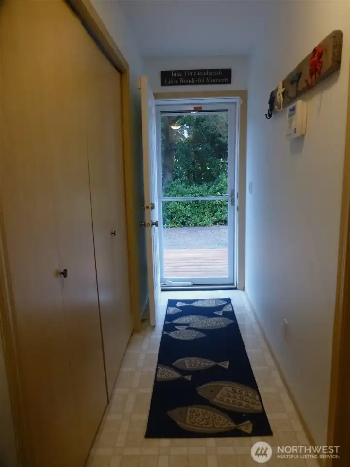 Side door from mud room/laundry area to side deck and driveway.