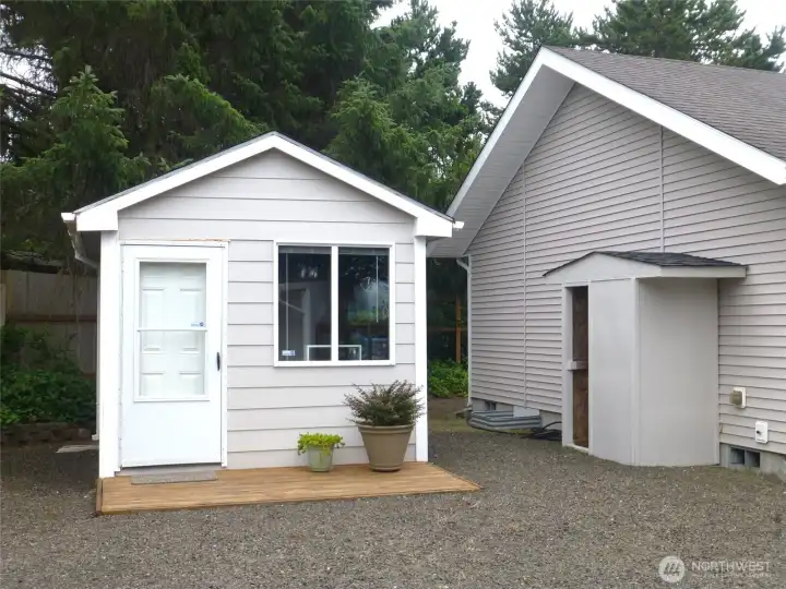 Finished storage building with freshly painted exterior.
