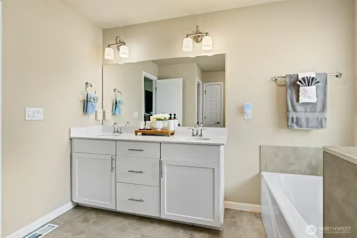 Primary bathroom offers a double vanity