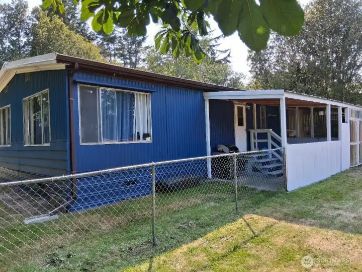 covered back porch with gate to side yard where you can have an rv, bonfire, and entertain your guests. the fenced in yard is perfect for the pets covered back porch with gate to side yard where you can have an rv, bonfire, and entertain your guests. the fenced in yard is perfect for the pets