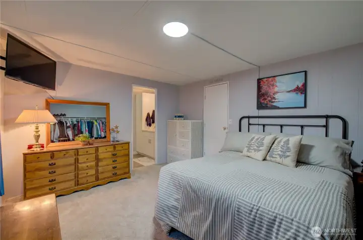 Primary bedroom with plenty of room for a bunk bed for a vacation home.