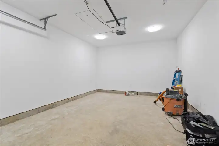 finished, attached 1 car garage.