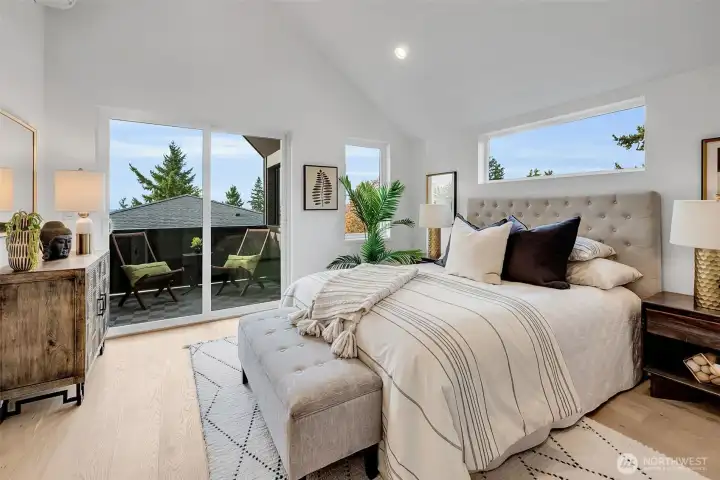 Primary bedroom facing west with private deck.
