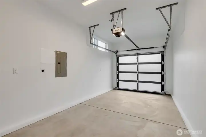 One car garage with EV charging.