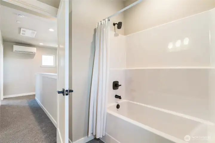 Staged photo of similar townhome. Not subject property.