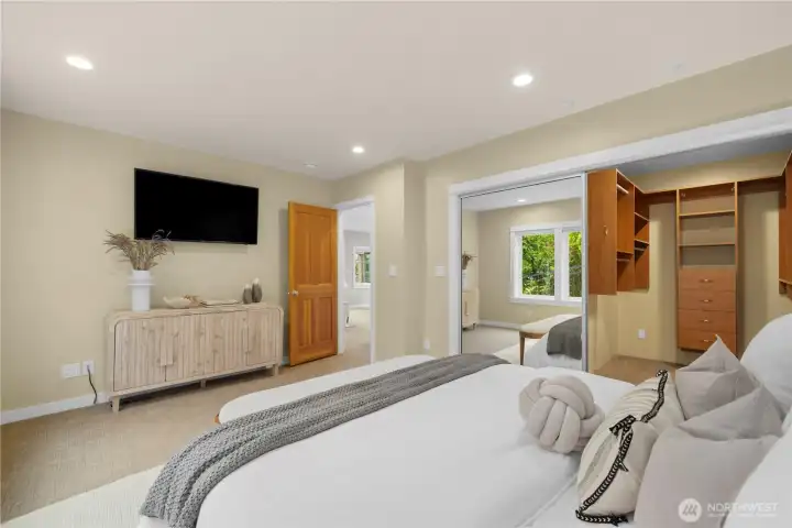 Primary bedroom with large walk-in closet.