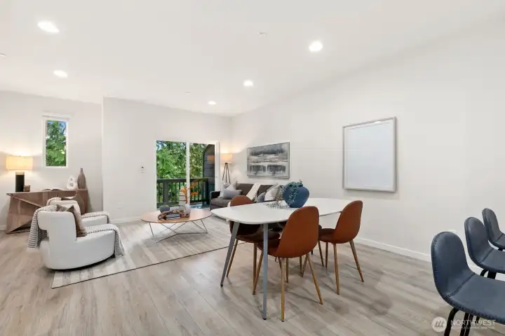 Vinyl flooring runs throughout property with exception of bedrooms, which all feature brand new carpet!