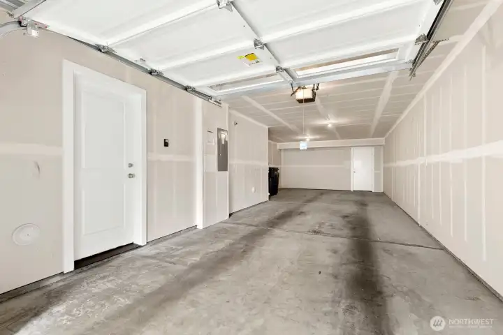 Large tandem, 2 car garage with storage space!