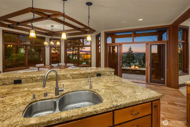 Dining & Kitchen area Flow to Stunning Patio for breathtaking Views.