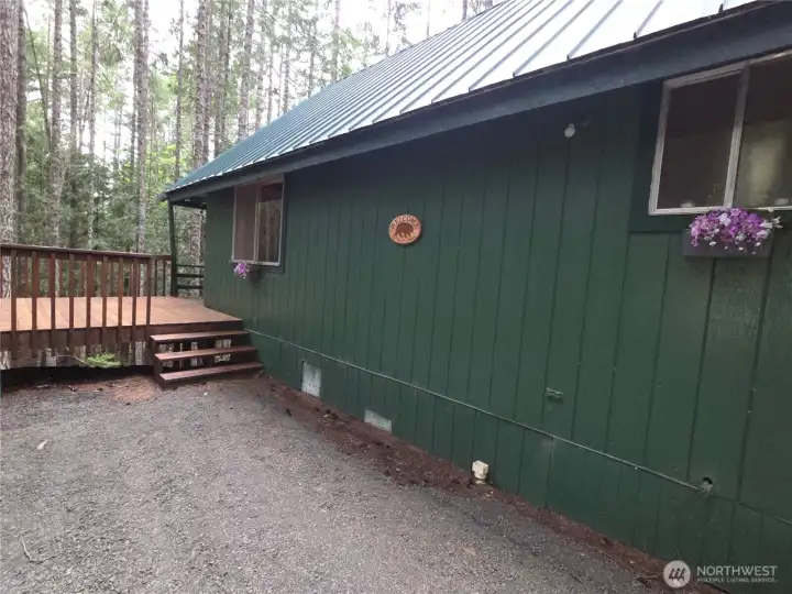 1 Story with Loft - & backside basement. Much bigger in person.