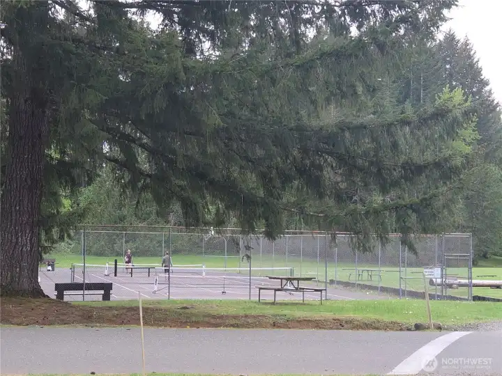 Tennis Pickle ball by Golf course Park.