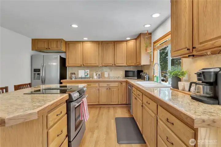 Kitchen with an abundance of cabinets and countertop space