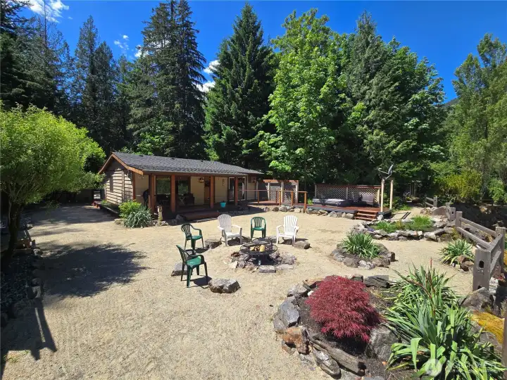 Beautiful backyard is covered with sand. Eliminates any mud being tracked into the home on rainy days. Beautiful backyard is covered with sand. Eliminates any mud being tracked into the home on rainy days.
