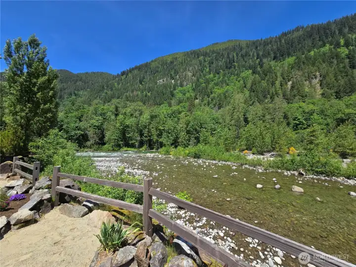 Gaze across the river to pristine, untouched trees and mountains. Enjoy the privacy. Gaze across the river to pristine, untouched trees and mountains. Enjoy the privacy.