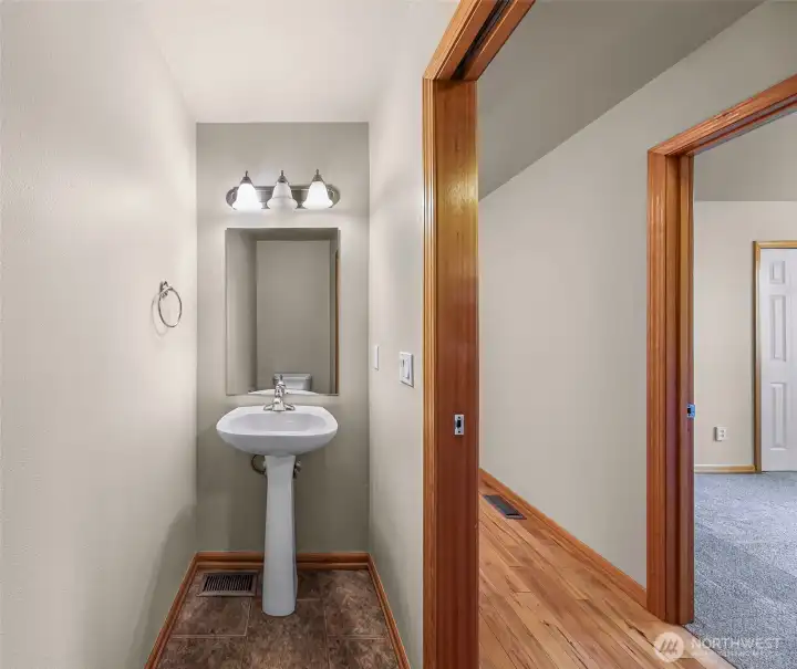 1/2 Bath on main level for guests 1/2 Bath on main level for guests
