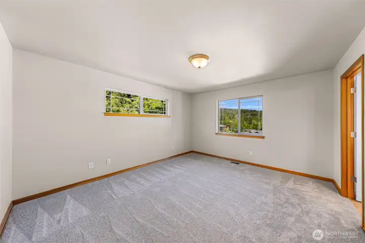 Primary bedroom has plenty of natural light Primary bedroom has plenty of natural light