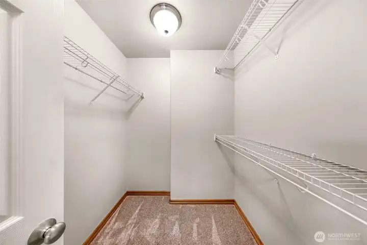 Large walk in closet in primary bedroom Large walk in closet in primary bedroom