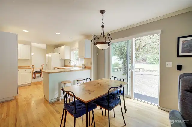 A sliding glass door provides access to the entertainment deck.