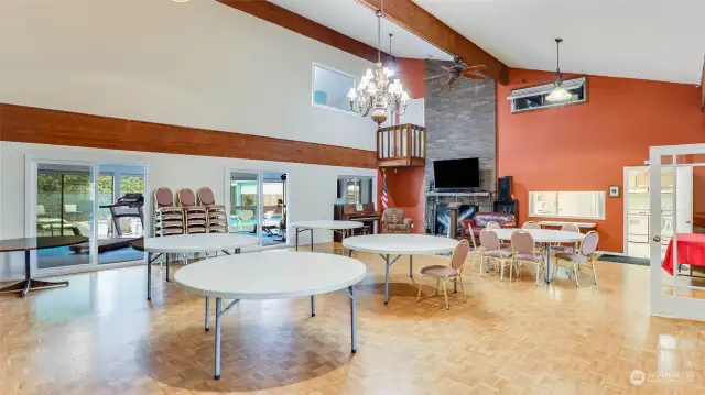 Large fellowship hall with vaulted ceilings, large scree TV, huge fire place and hardwood floors. available to you for you to use for personal events.