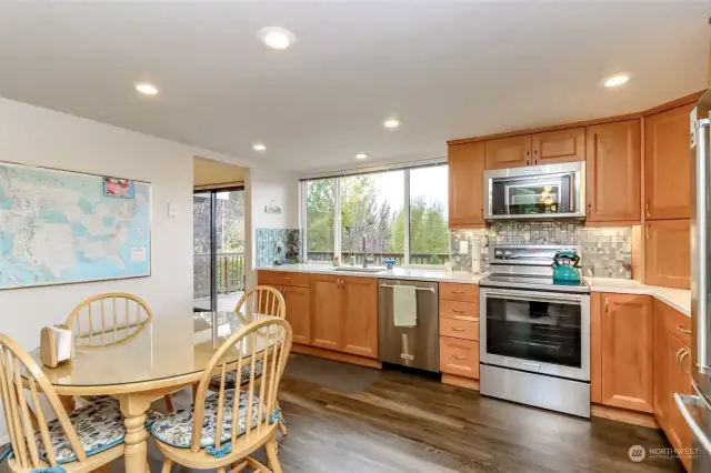 The kitchen was fully remodeled with new hardwood cabinets, quartz countertops, all new appliances and LVP flooring.