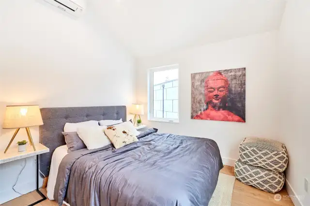 Second upper floor bedroom with mini-split for personalized comfort control.