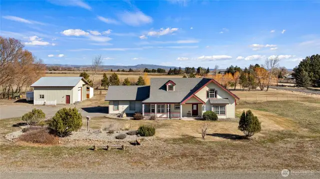 Welcome to 50 Curlew, featuring a lovely 2400+sft home with large shop & 2 stall barn on 3+ acres.