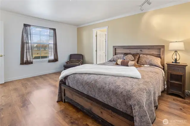 Spacious main floor primary suite.