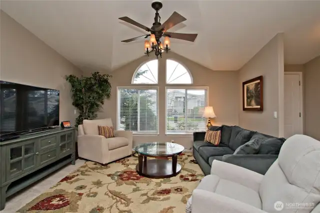 Living room with vaulted ceilings