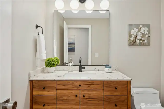 This beautiful custom vanity graces the main floor powder room.