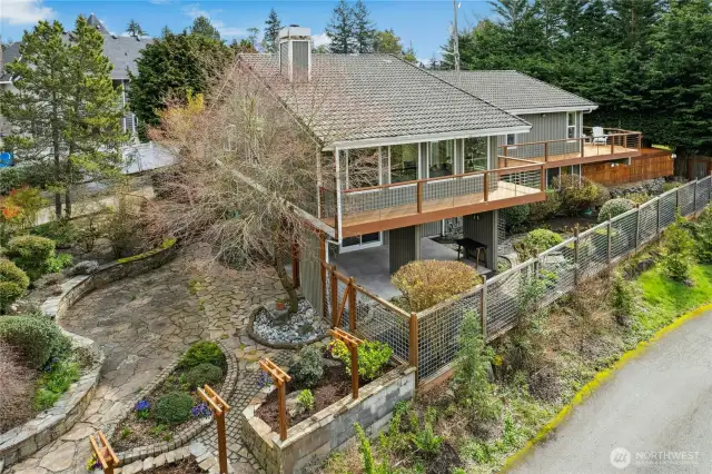 The outdoor spaces are just fantastic. From stone-cobbled patios, to rich natural wood decking and an expansive covered patio, you'll experience unity with the surrounding natural environment.
