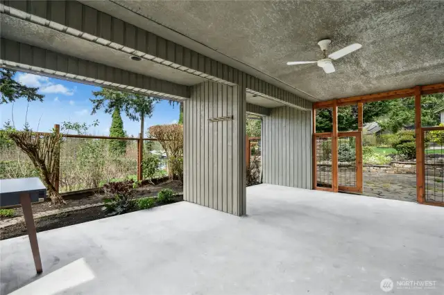 This expansive covered patio off the lower living room seamlessly extends the interior living area to the outdoors.