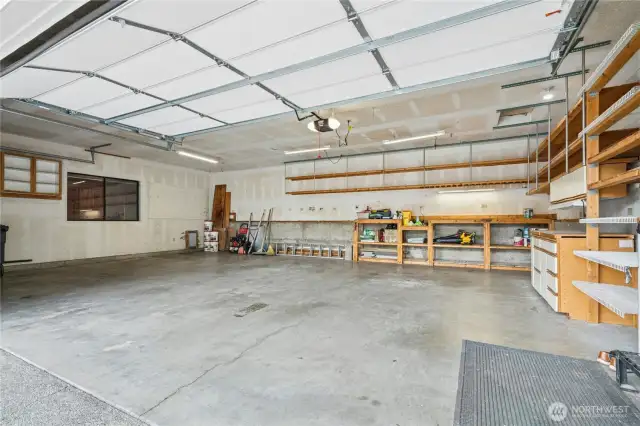Attached three car garage with plenty of storage.