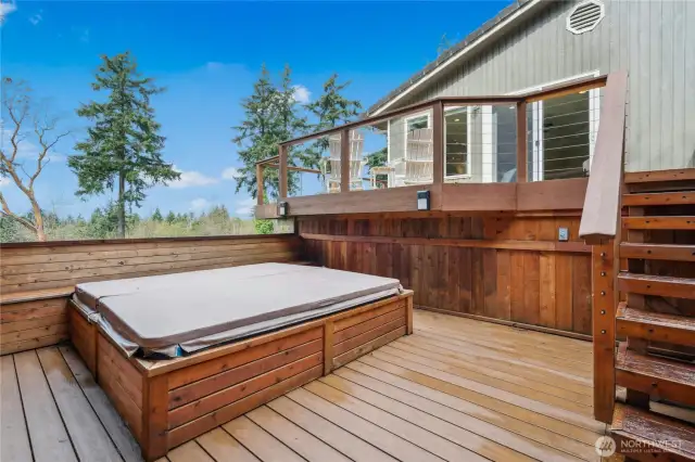 Hot tub is just steps off the primary suite. Soak under the stars in total privacy.